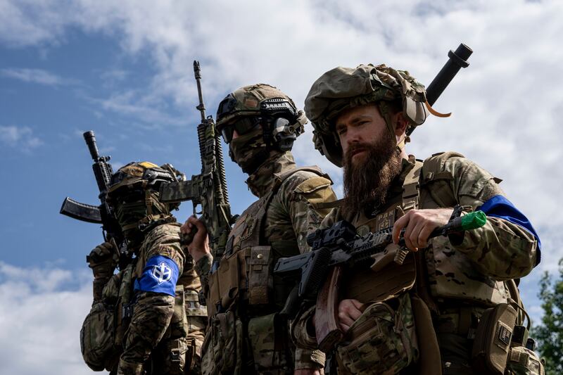 Fighters of Russian Volunteer Corps (Evgeniy Maloletka/AP)