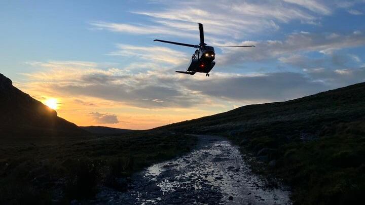 A helicopter called to winch a walker from the Mourne Mountains. PICTURE: MOURNE MOUNTAIN RESCUE TEAM