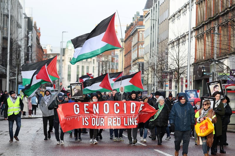 Palestine Campaigners take part in a march from Writers Square to Erskine House in Belfast City Centre. PICTURE: MAL MCCANN