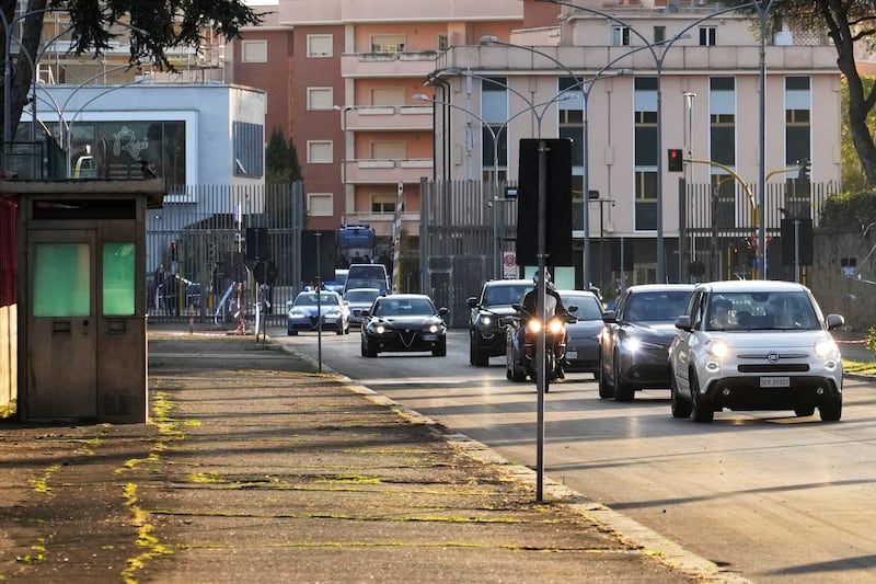 The motorcade escorting Pope Francis arrives at Rebibbia prison (Gregorio Borgia/AP)