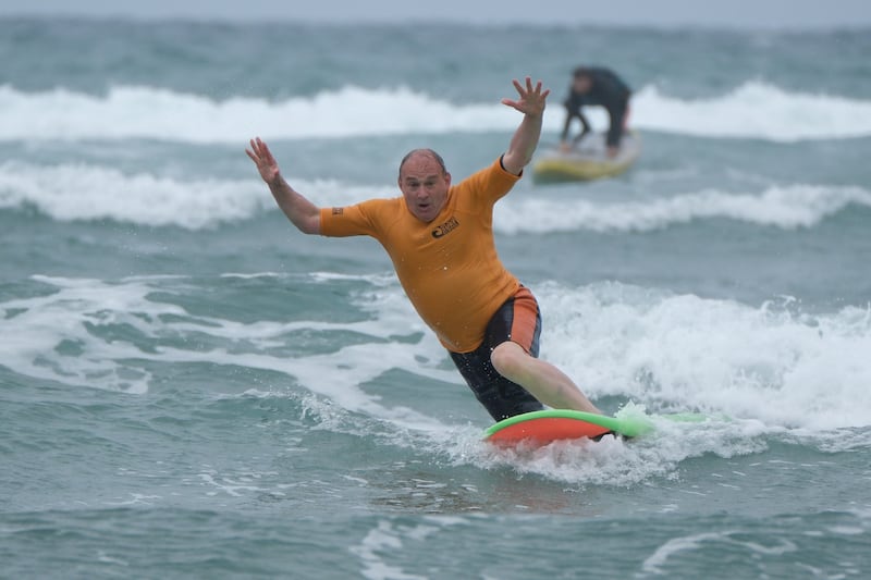 Sir Ed Davey on one of his campaign stunts – a surf lesson in Bude, Cornwall