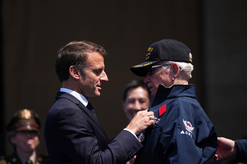Victor Charey is awarded the Legion of Honour by Emmanuel Macron (Daniel Cole/AP)