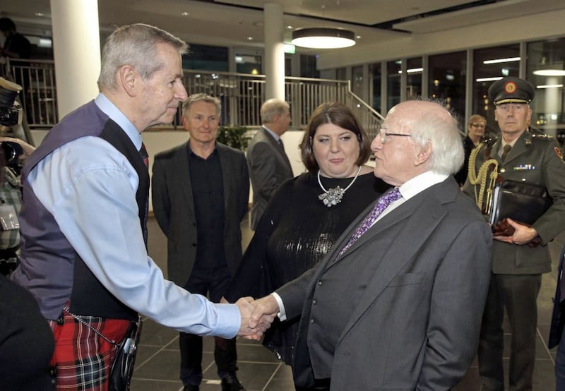 4 Feb 2018 - Irish President Michael D Higgins meeting Richard Parkes, pipe major with the Field Marshal Montgomery Pipe Band, at the Waterfront Hall last night during a pre-concert reception before the Traditional Music Awards evening. Picture by Cliff Donaldson. 