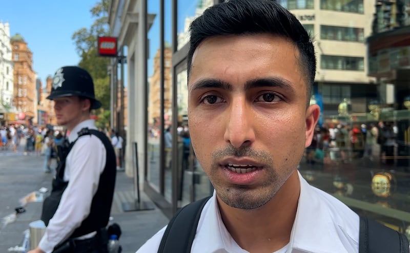 Security guard Abdullah, 29, who works at TWG Tea shop at the scene in Leicester Square, London