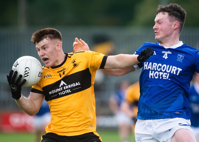 St Eunan's forward Conor O'Donnell jnr fends off Ultan Doherty. Picture: Evan Logan