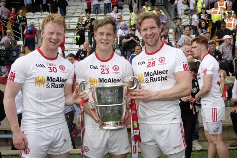 Pomeroy trio Hugh Pat McGeary, Kieran McGeary and Frank Burns with the Anglo-Celt Cup last year. 