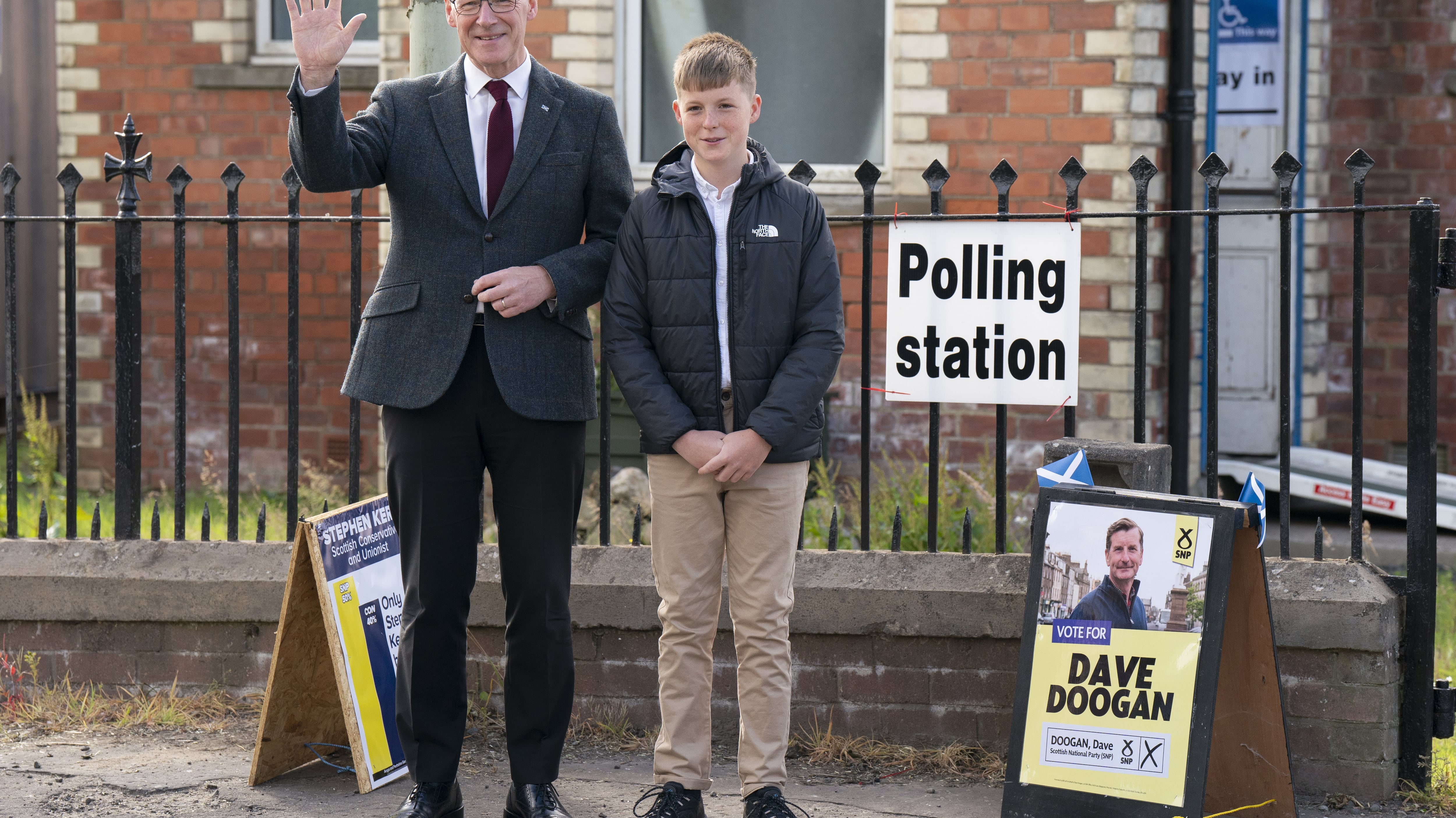 Scottish First Minister and SNP leader John Swinney, with his son Matthew, voted in Perthshire