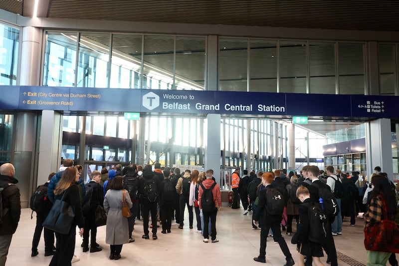 Train passengers arrive and depart from Grand Central Station in Belfast. PICTURE: MAL MCCANN