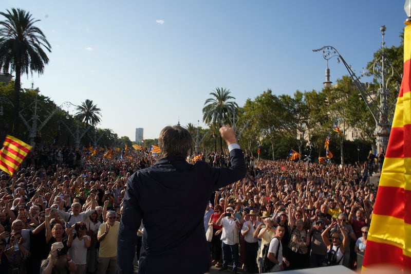 Catalan independence leader Carles Puigdemont addresses supporters in Barcelona (Emilio Morenatti/AP)