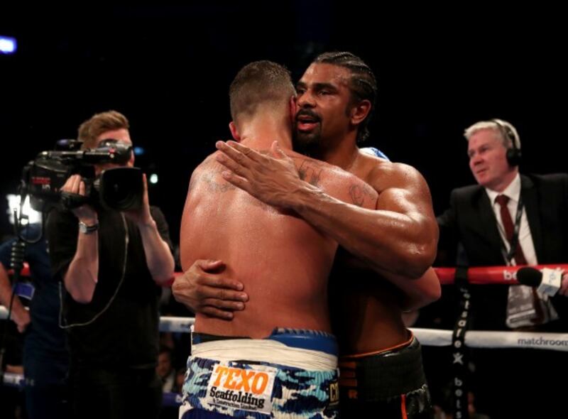 David Haye (right) embraces Tony Bellew after losing the heavyweight contest at The O2.