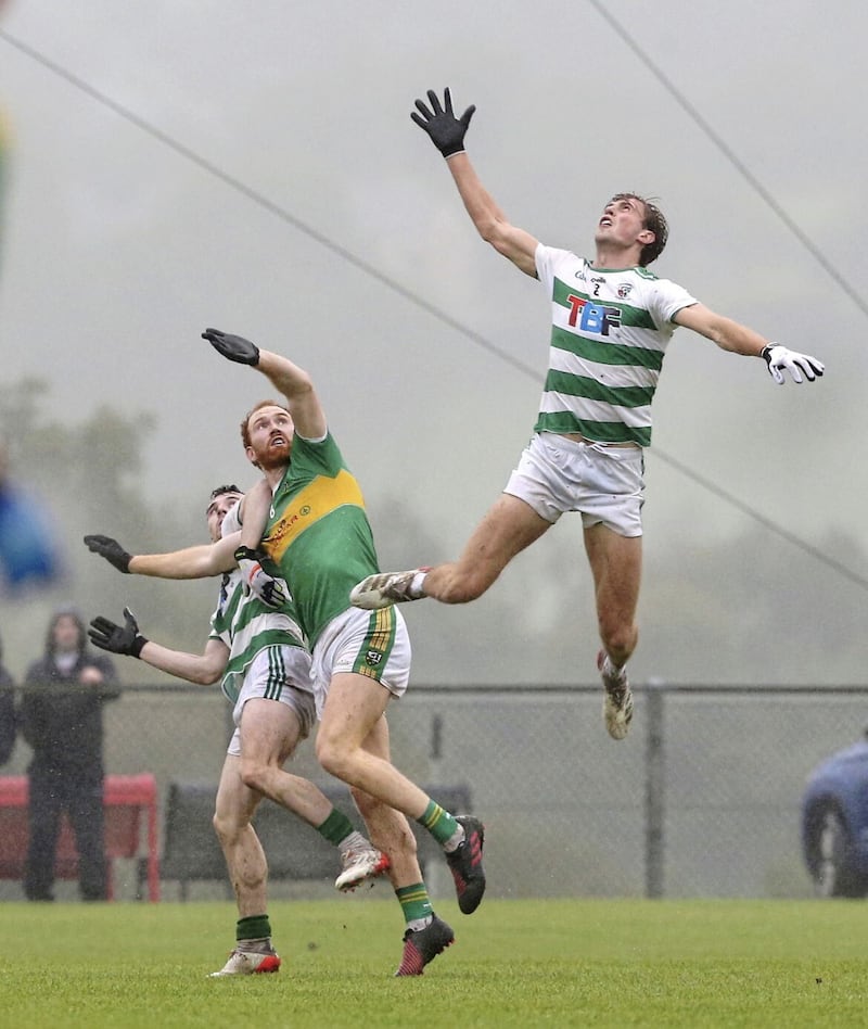 Anton Tohill (right) turned the momentum in Swatragh's favour with his first point against Bellaghy in their Derry SFC last 16 tie at Owenbeg 