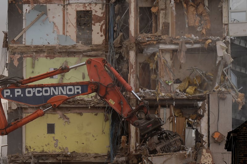 The interiors of the flats could be seen as the building was demolished