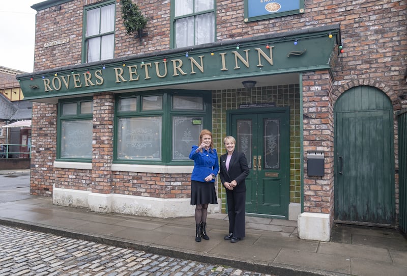 Sarah, Duchess of York with Coronation Street actor Sally Dynevor outside the Rovers Return