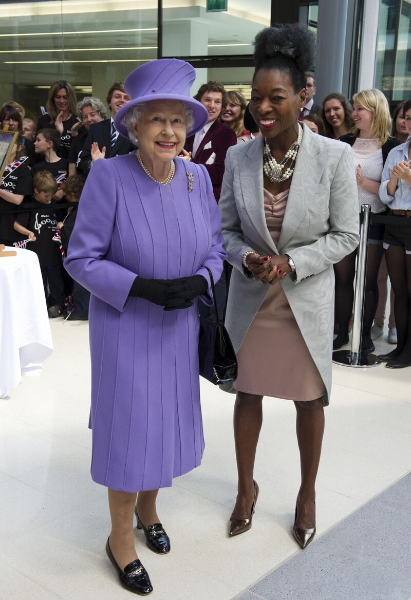 The late Queen Elizabeth II with Baroness Floella Benjamin during a visit to Exeter University as part of the Diamond Jubilee tour of the UK
