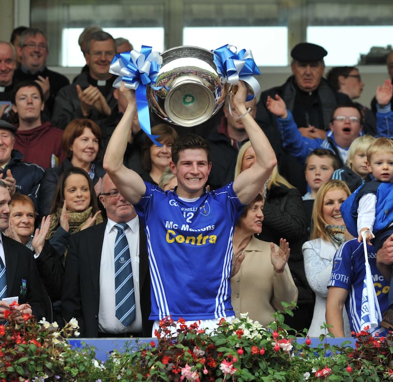 Darren Hughes lifts the Mick Duffy Cup after Scotstown&rsquo;s Monaghan SFC final win over Clontibret in 2013. After losing last year&rsquo;s decider to Clontibret, Scotstown are favourites to reclaim the title against a Monaghan Harps side seeking the club&rsquo;s first SFC win in 92 years