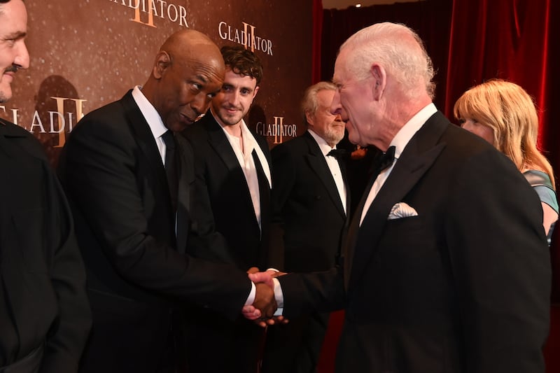 The King meets Denzel Washington and Paul Mescal whilst attending the Royal film performance and world premiere of Gladiator II