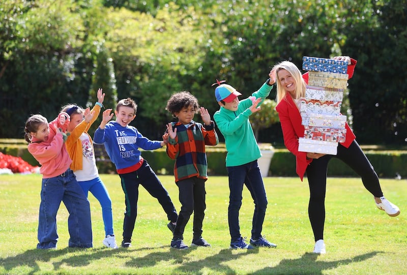 Pictured at the launch of the Team Hope Christmas Shoebox Appeal are  Daisy-Bow Browne, 8, Mia Munroe, 7, Joshua Browne, 10, Matthew Harper, 7 and Joshua Munroe, 10 with RTE presenter, Jacqui Hurley