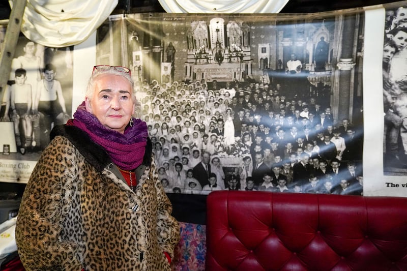 Terry Mckeown beside an archived picture of St Joseph's Church. PICTURE: JORDAN TREANOR