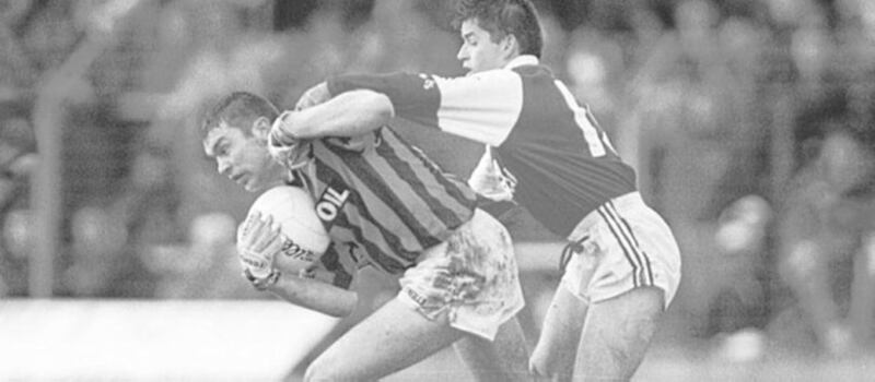 OISIN IN MOTION... Man of the match, Crossmaglen&rsquo;s Oisin McConville, fights off the attentions of Eire Og&rsquo;s Willie Quinlan during the Armagh side&rsquo;s All-Ireland Club semifinal victory at Navan yesterday 