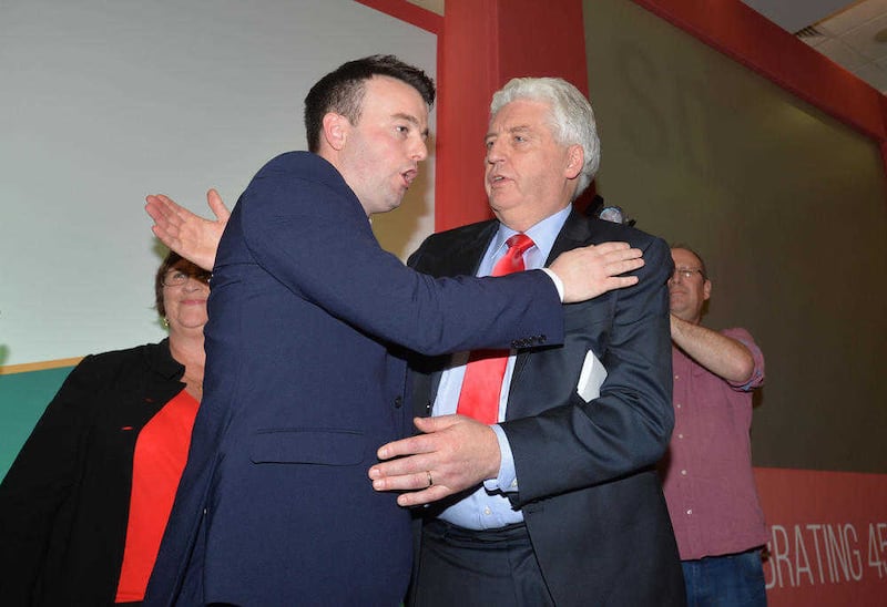 New SDLP leader Colum Eastwood consoles predecessor Alasdair McDonnell after winning the SDLP leadership contest Colm Lenaghan/Pacemaker Press. 