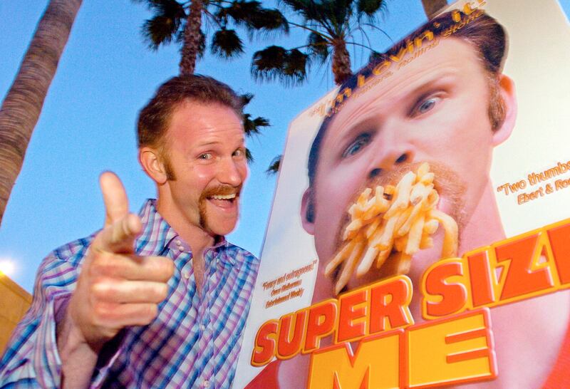Morgan Spurlock poses at the Los Angeles premiere of his film Super Size Me in 2004 (Mark J Terrill/AP)