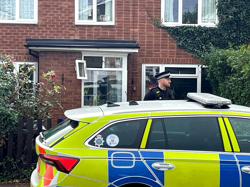 A police officer outside a property in Main Street, Stonnall, Staffordshire, after Mr Price’s death