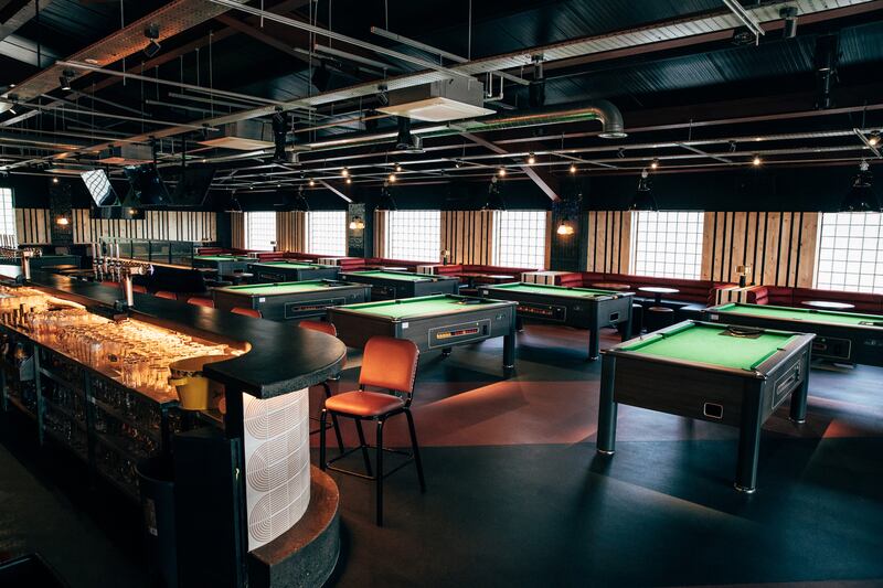 The Whitefort's upstairs sports bar includes 11 pool tables.