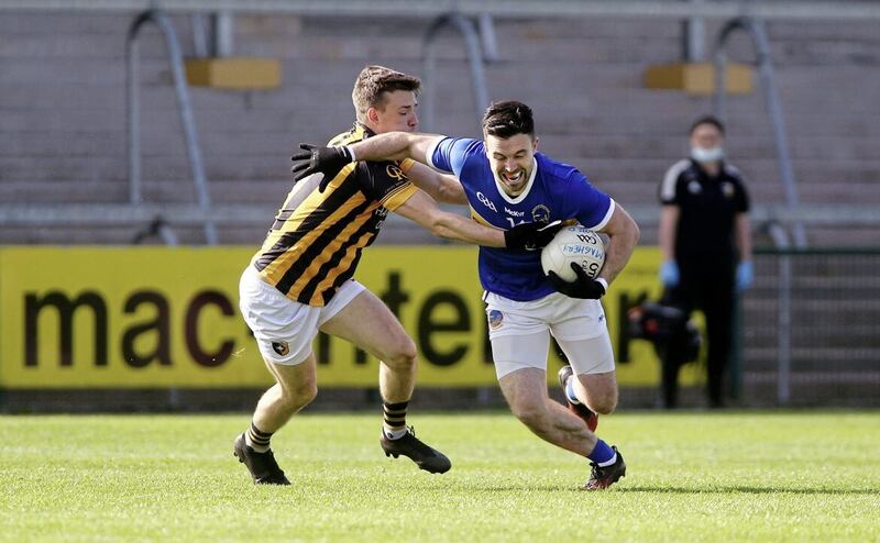 Crossmaglen's Paul Hughes tackles Maghery's Aidan Forker. Picture: Seamus Loughran. 