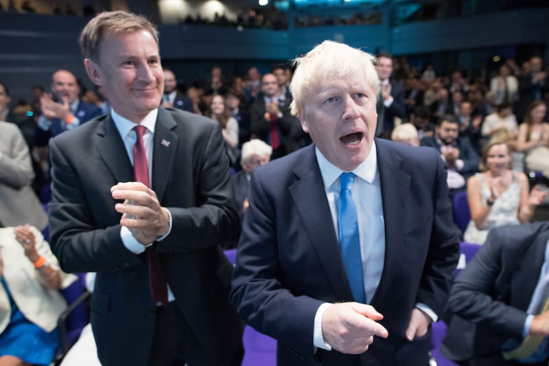 Jeremy Hunt and Boris Johnson at the Queen Elizabeth II Centre in London when Mr Johnson was announced as the new Conservative Party leader in 2019