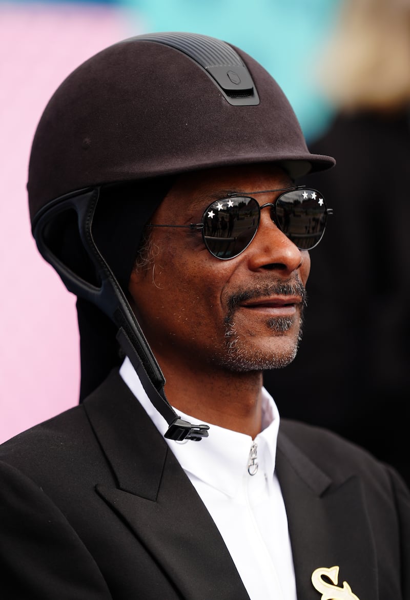 Snoop Dogg watching the dressage team grand prix special