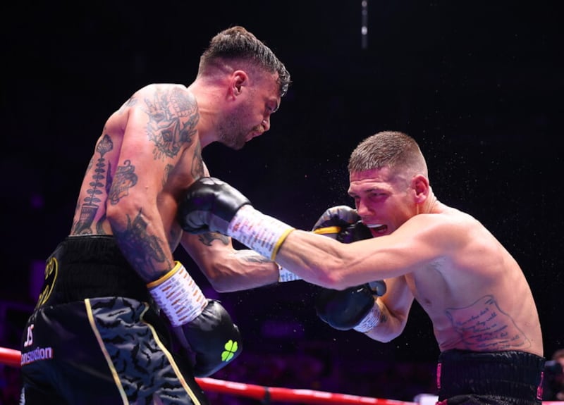 Tyrone McKenna battles it out with Chris Jenkins