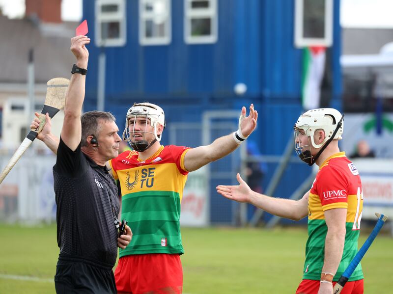Carlow's Chris Nolan gets a red card playing against Antrim at Corrigan Park. PICTURE: MAL MCCANN