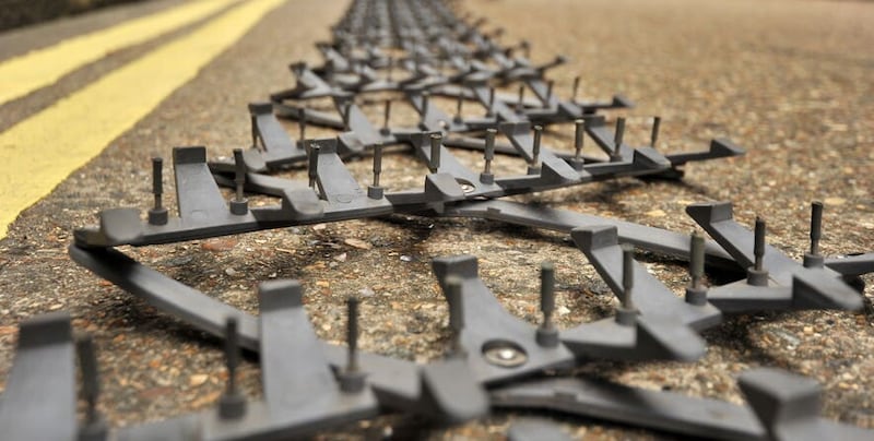 A Police stinger spike strip (Andrew Matthews/PA)