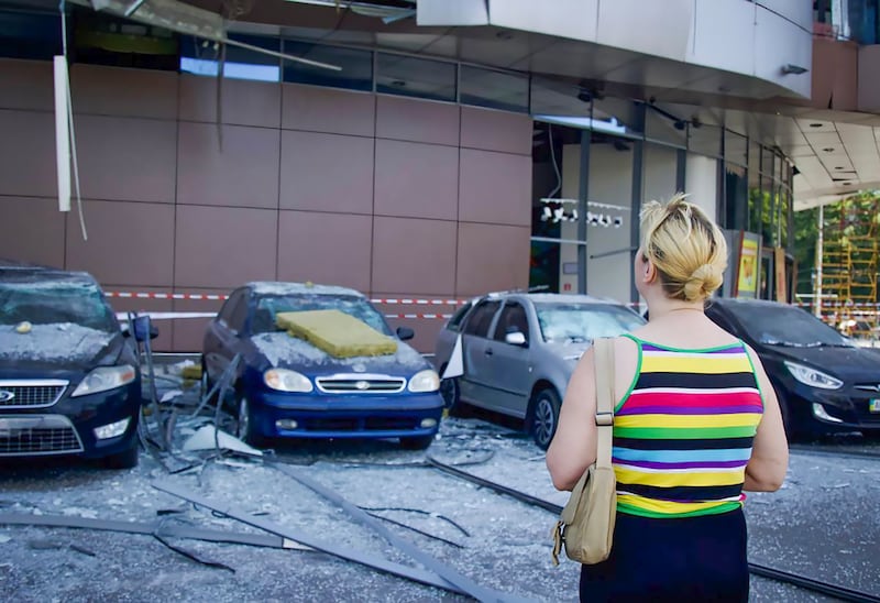 Debris from Russia’s missile attack struck a shopping mall, two schools, three kindergartens and the intensive care unit of a children’s hospital (Dnipro Regional Administration via AP)