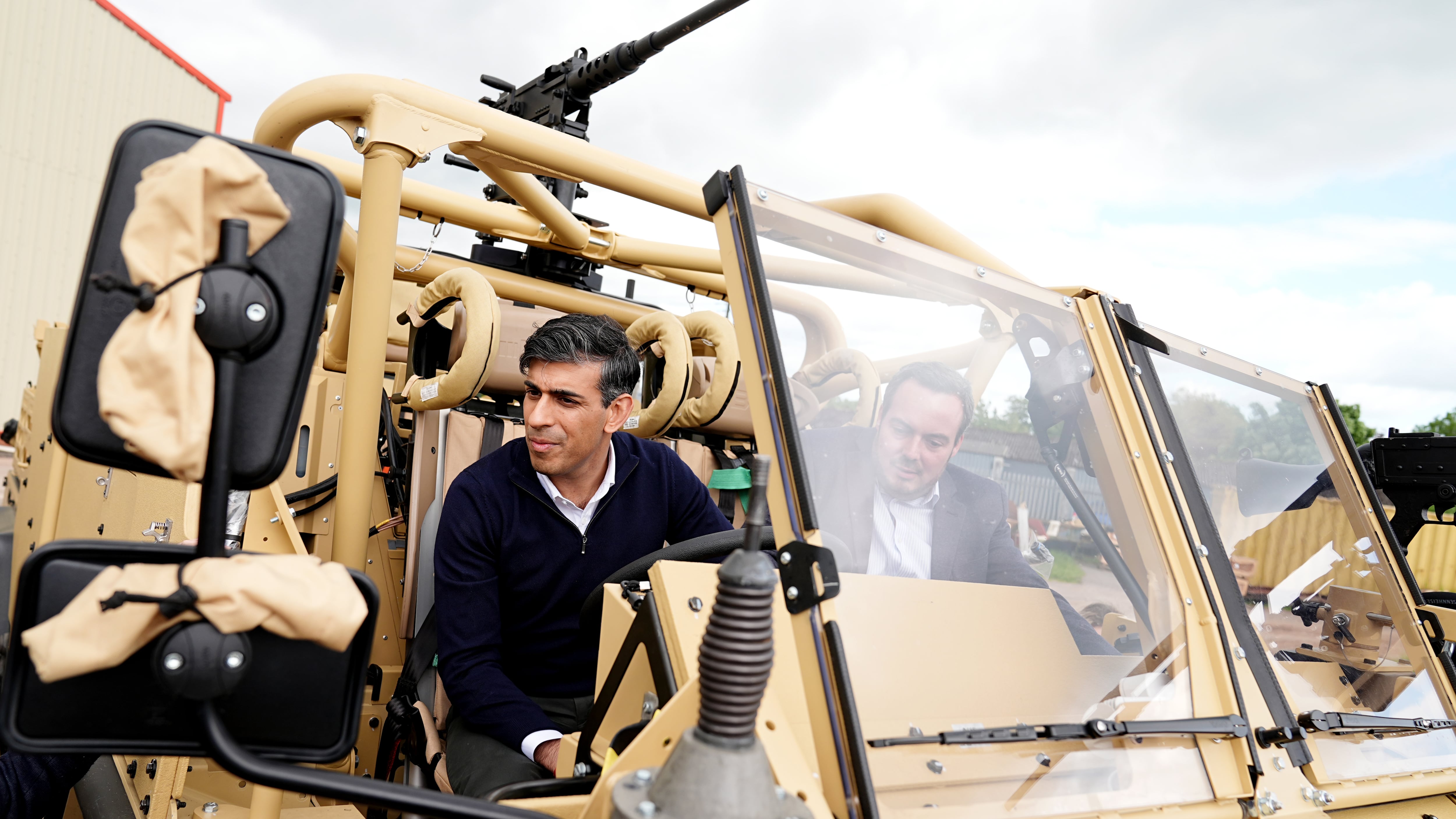 Prime Minister Rishi Sunak, pictured on a visit to defence vehicle manufacturer Supacat in Exeter, wants to introduce a new form of national service