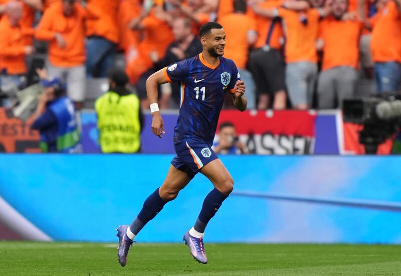 Cody Gakpo celebrates scoring the Netherlands’ first goal against Romania