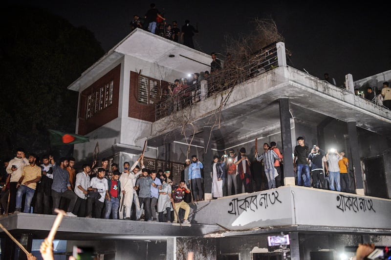 Protesters vandalise the residence of Sheikh Mujibur Rahman, Bangladesh’s former leader and the father of ousted prime minister Sheikh Hasina (Mahmud Hossain Opu/AP)