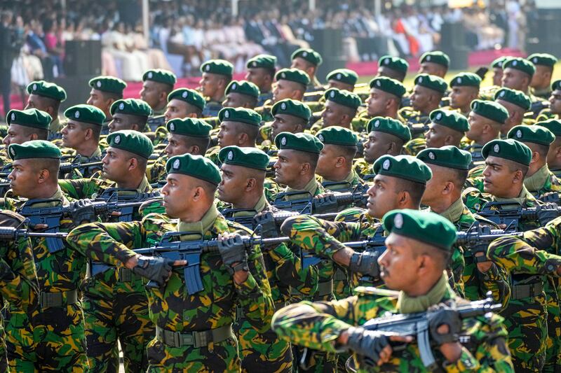 Members of the Sri Lanka’s police special task force march during the country’s Independence Day ceremony (Eranga Jayawardena/AP)