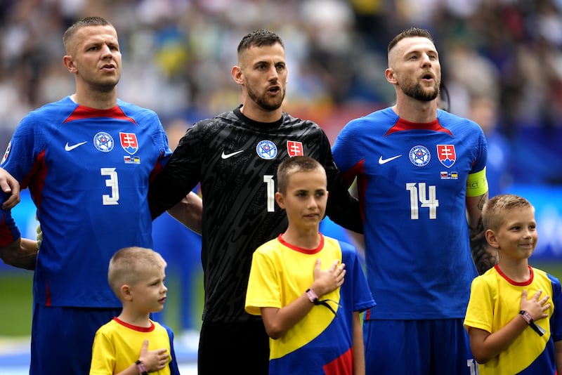 Slovakia captain Milan Skriniar (right) will make life tough for England