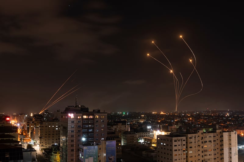 Rockets fired from Gaza and intercepted by Israel’s Iron Dome anti-missile system (Fatima Shbair/AP)