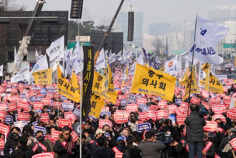 Doctors stage a rally against the government’s medical policy in Seoul, South Korea (Ahn Young-joon/AP)