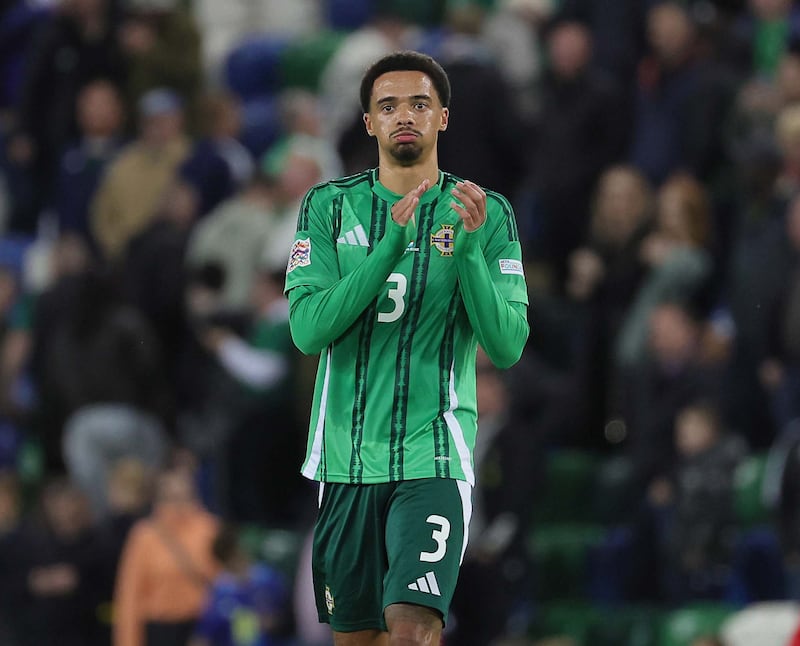 Northern Ireland's Jamal Lewis applauds the fans after the win over Luxembourg.