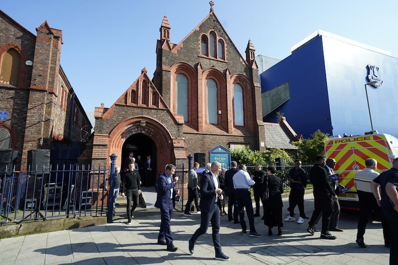 Ian Woan leaves the St Luke’s Church following Wednesday’s memorial ceremony