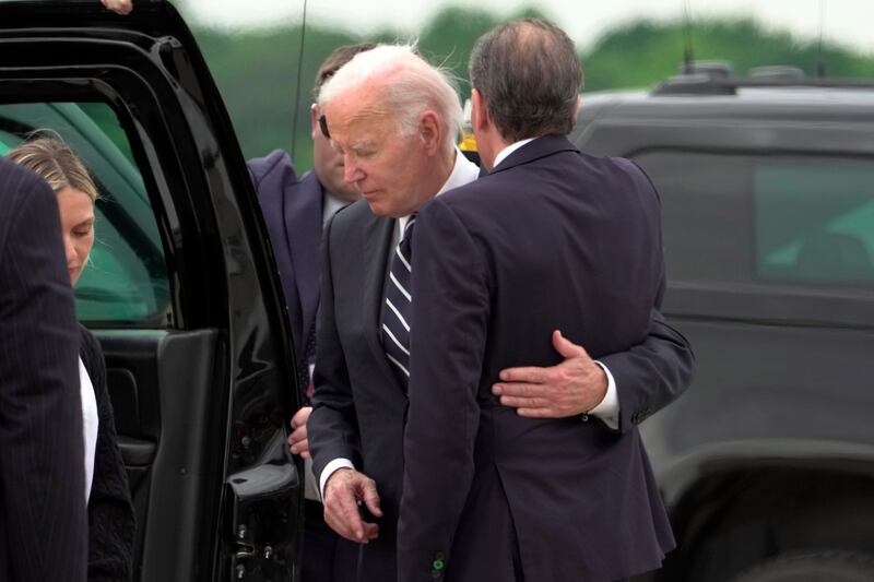 President Joe Biden greets his son Hunter Biden at Delaware Air National Guard Base in New Castle (Manuel Balce Ceneta/AP)