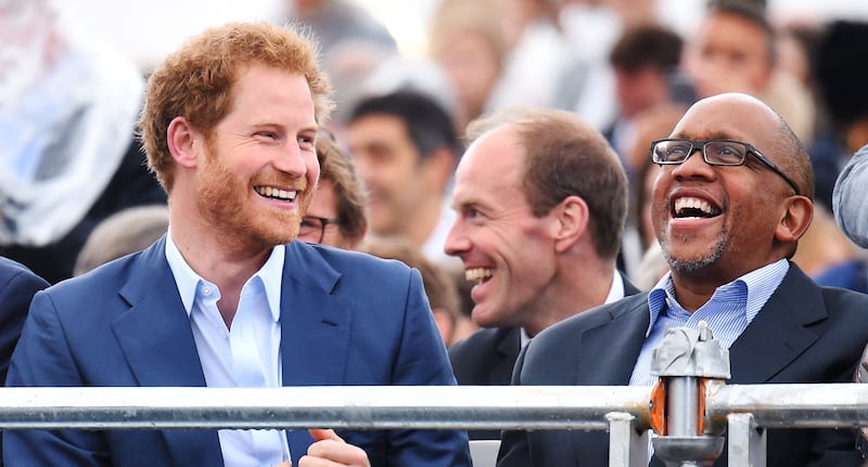 Harry with Prince Seeiso during a Sentebale concert at Kensington Palace Gardens