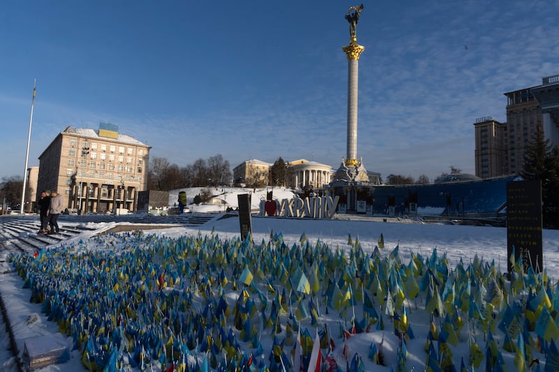 Flags at the memorial site in Independence Square in Kyiv (Efrem Lukatsky/AP)