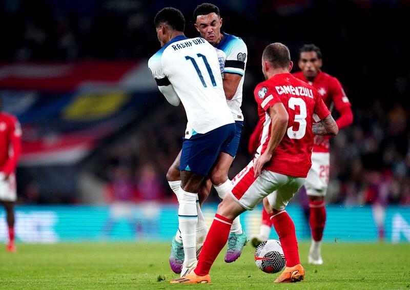 England’s Marcus Rashford and Trent Alexander-Arnold clash