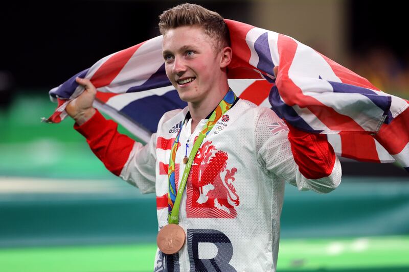 Nile Wilson celebrates winning the bronze medal in the men’s horizontal bar at the Rio Olympics in 2016