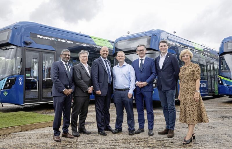 Wrightbus CEO, Jean-Marc Gales (third from right), pictured at the launch of the new hyrdogen bus fleet with (L-R): Manish Patel, Air Products; Henry Smith MP; Roads Minister, Richard Holden; Ed Wills, Brighton and Hove Buses; Matt Furniss, Surrey County Council; and Clare Hollingsworth, Go-Ahead Group. 