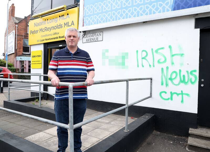 Alliance Councillor Michael Long at the partys office on the Newtownards Road where graffiti was sprayed overnight. PIcture Mal McCann